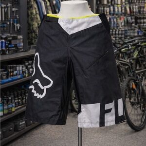 Fox black & white demo shorts, mesh interior, vented with slide buckle at waist